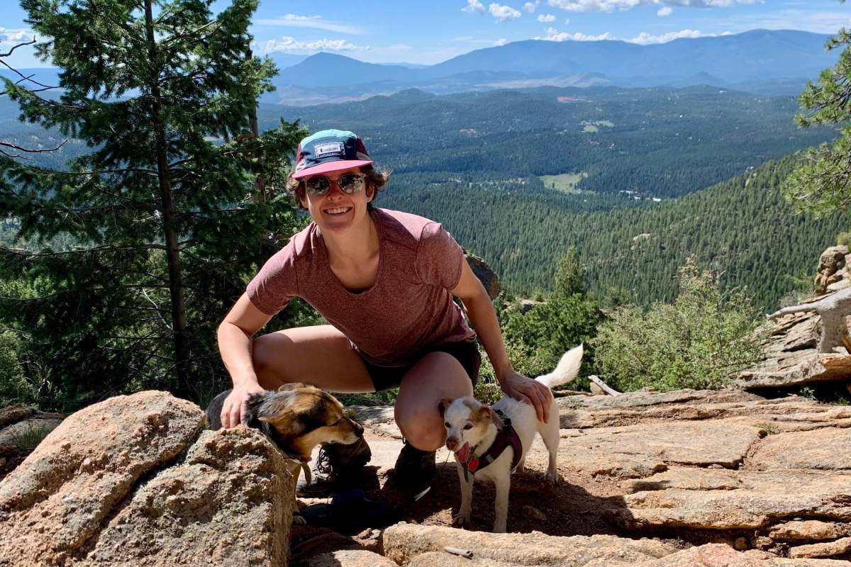 person with two dogs