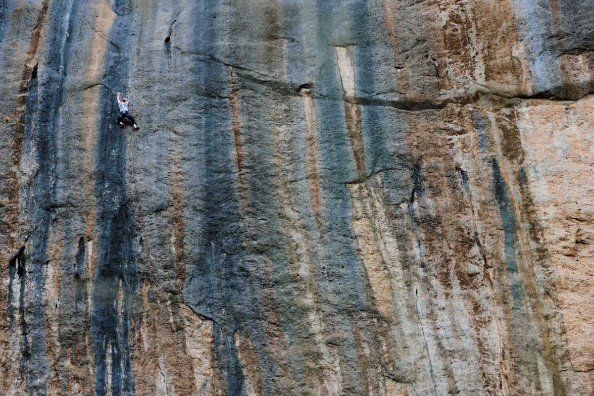 wide shot of climber on wall