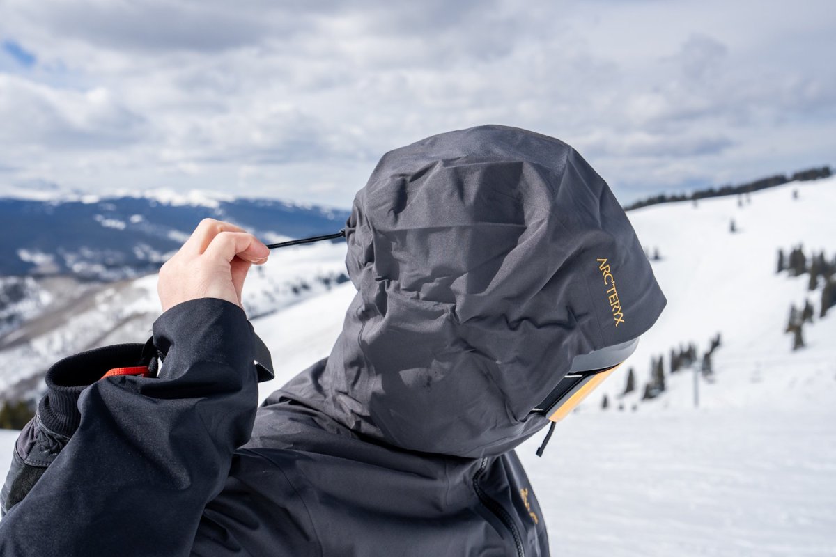 Arc'teryx Rush jacket hood being adjusted