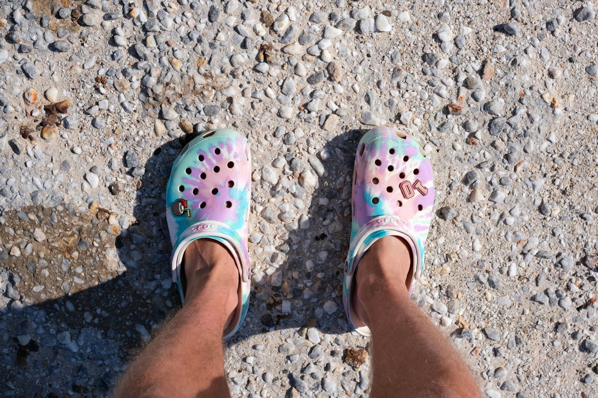 Crocs on pebbled ground