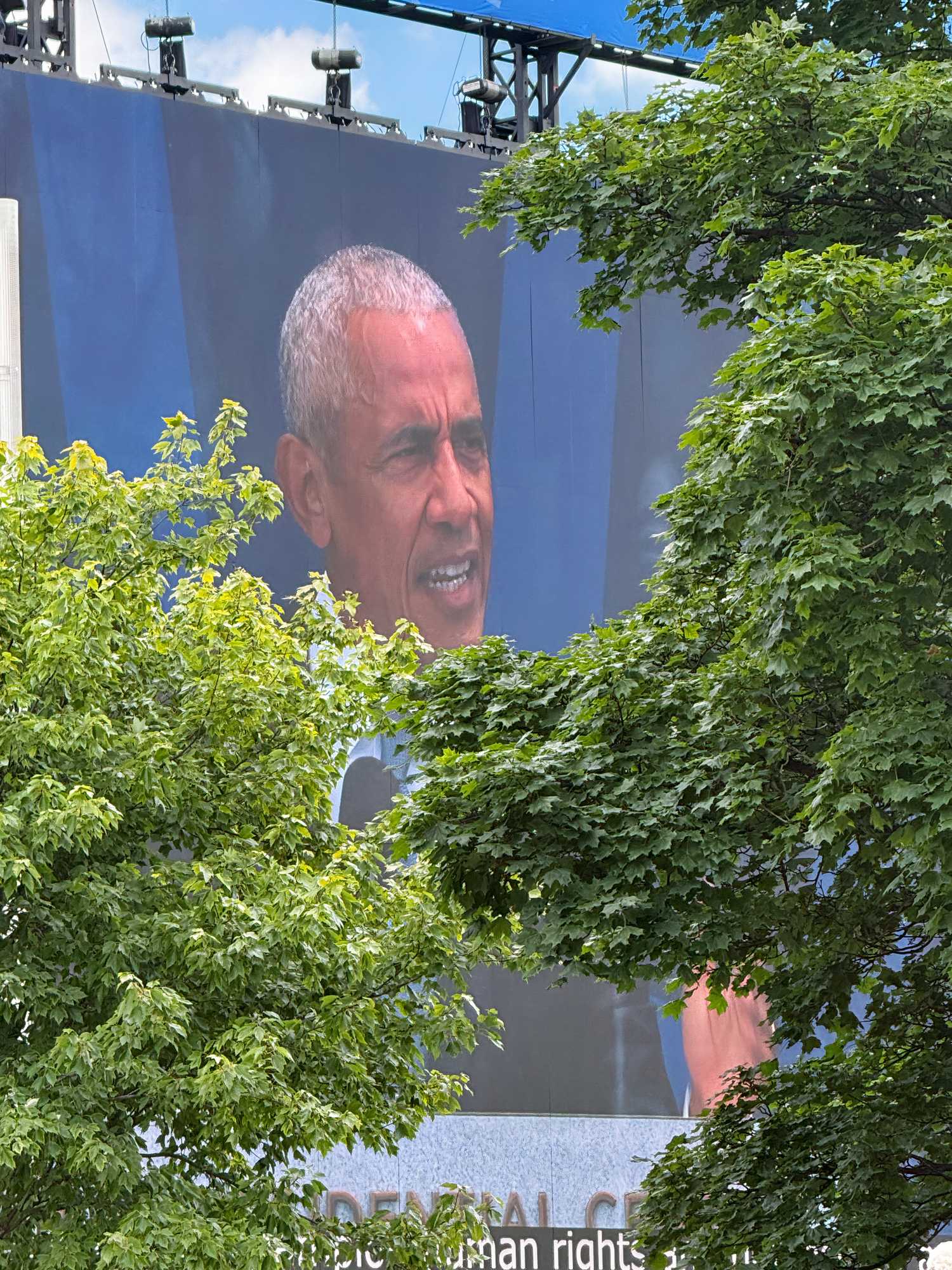 Former President Obama's presidential center remarks televised on a jumbo screen at nearby Jackson Park in Chicago (Derricke Dennis).