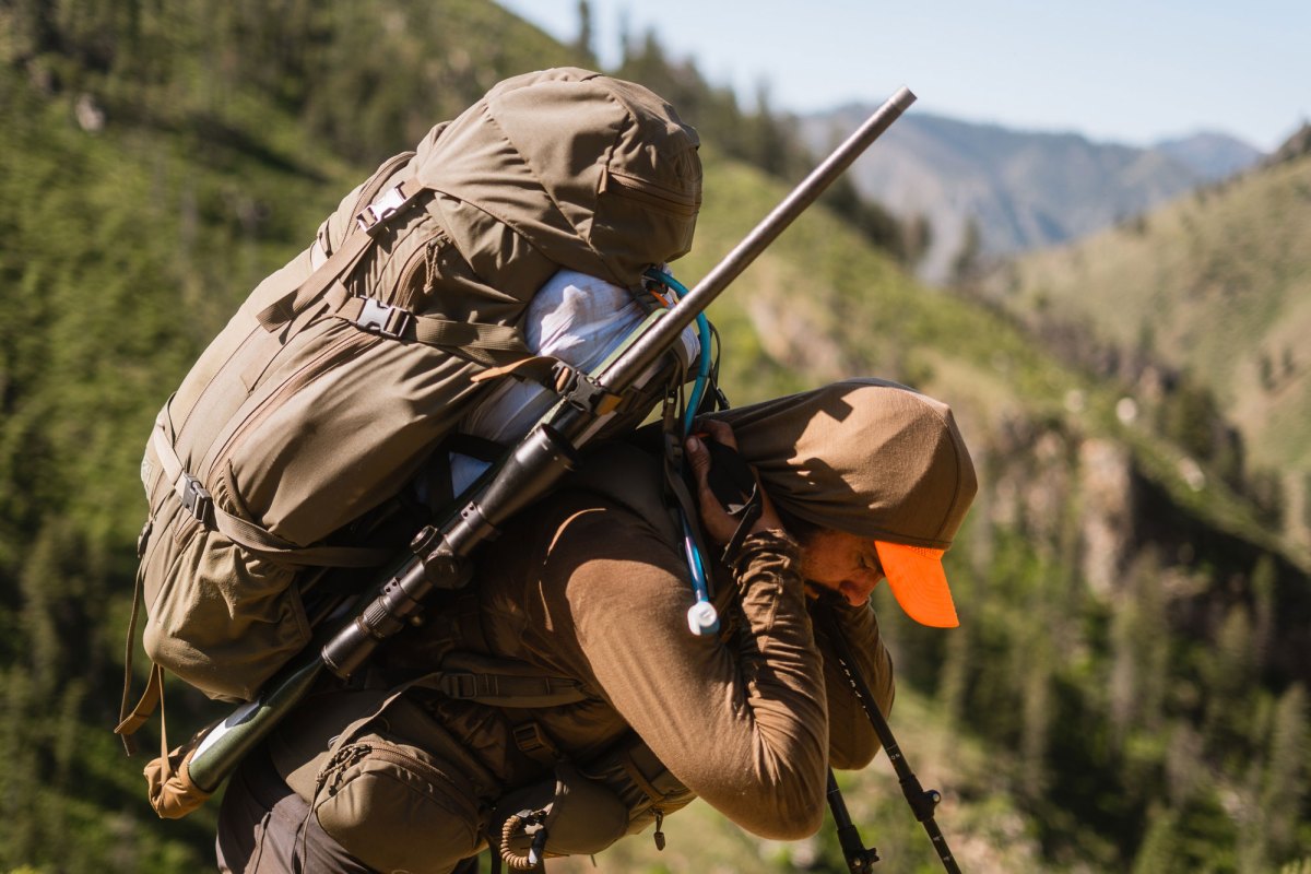 a man in hunting gear