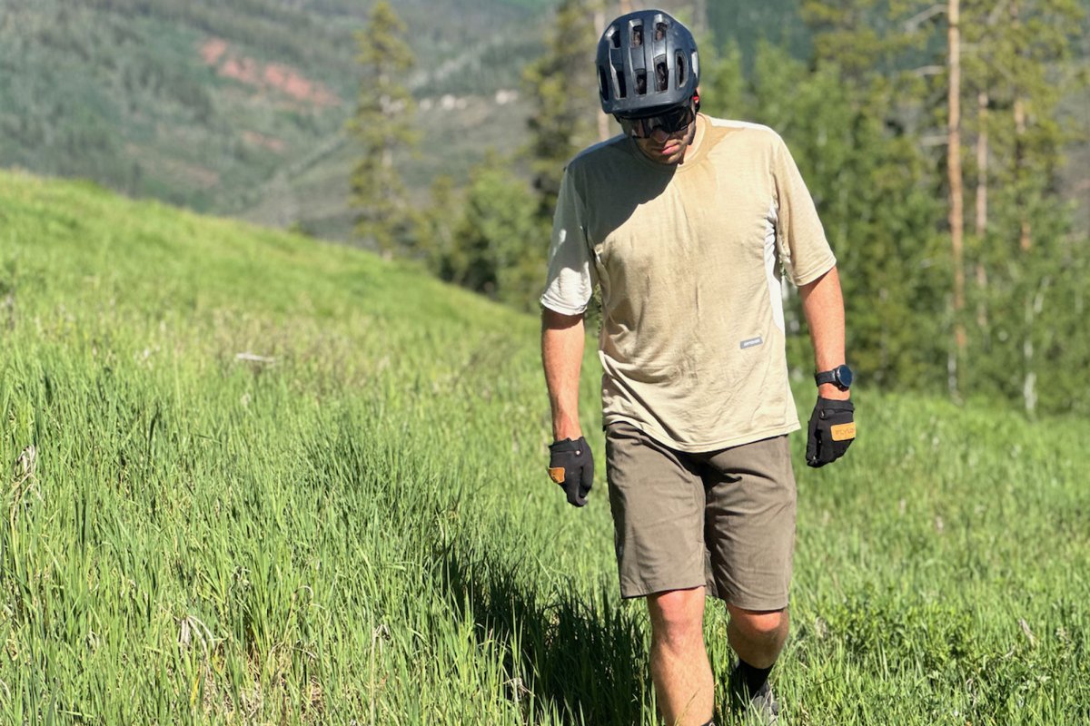 a man walking in the fiels in Ortovox Sequence Free Kit