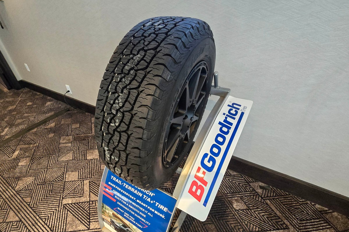 BFGoodrich Trail-Terrain T/A+ tire displayed on a stand