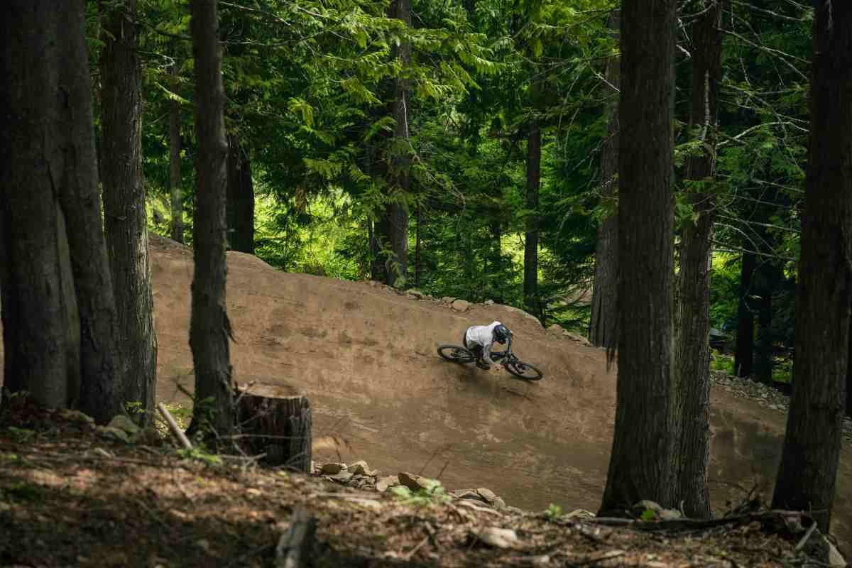 GL trail designer and project manager Dane Tudor testing upper Obsidius, which has nine 30- to 32-foot jumps and massive berms; photo/Ashley Voykin