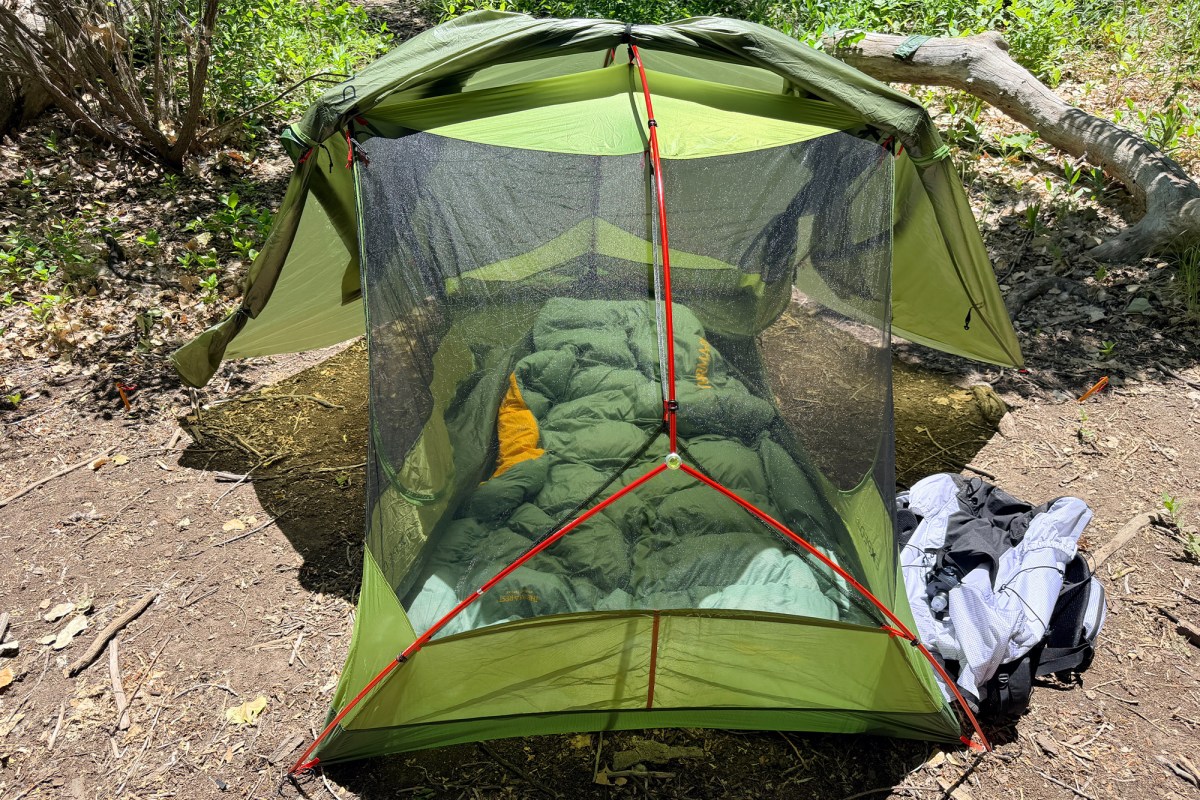 Exped Cassira tent with rolled rainfly and sleeping bags inside