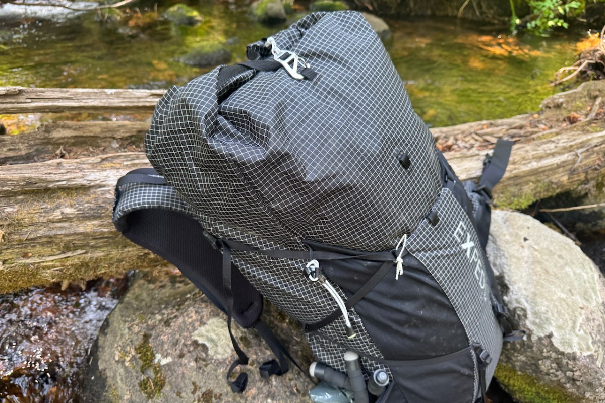 Roll top closure and side compression system on the Exped backpack