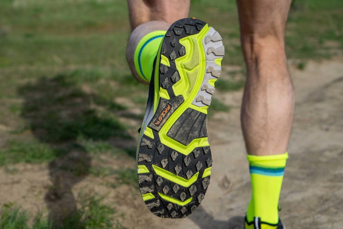 Close up of lugs on a trail running shoe
