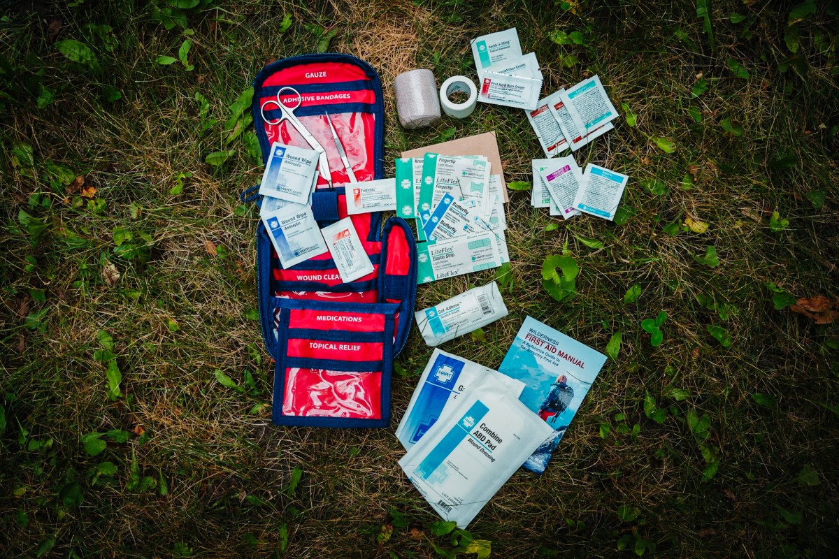 HART outdoor first aid kit contents spread out on the ground
