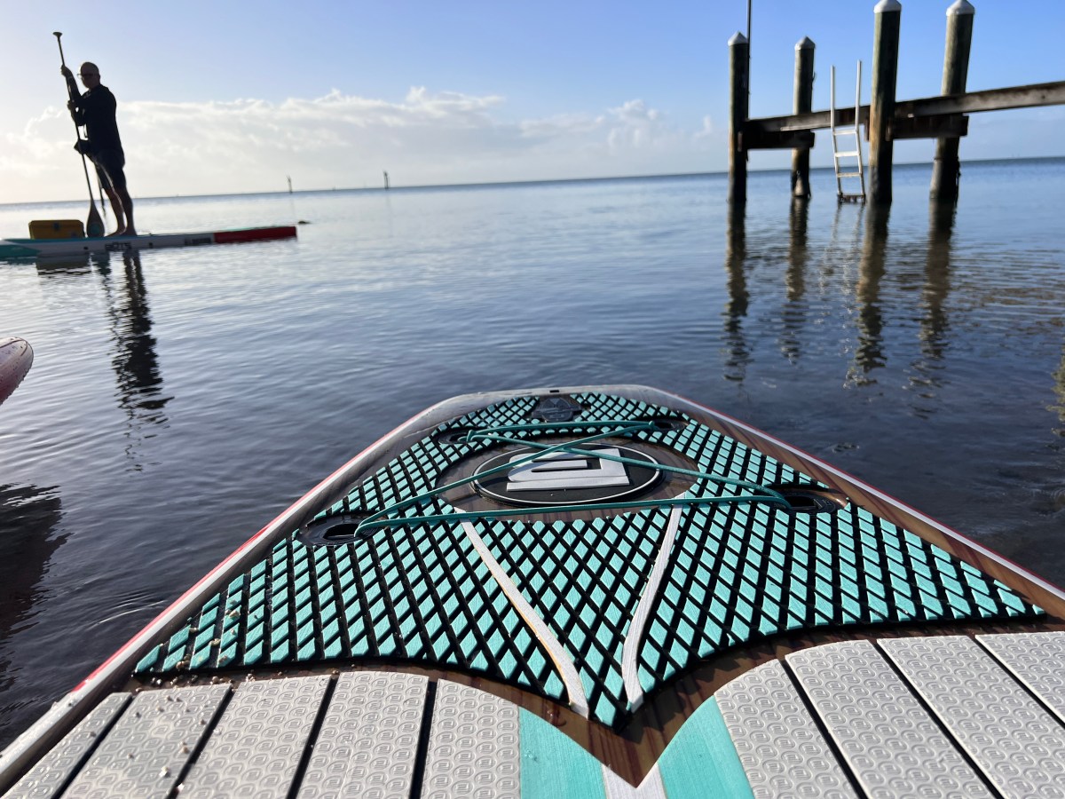 Bungee cords are often placed on the front, back, or both ends of the SUP to hold gear like dry bags or jackets; (photo/Morgan Tilton)