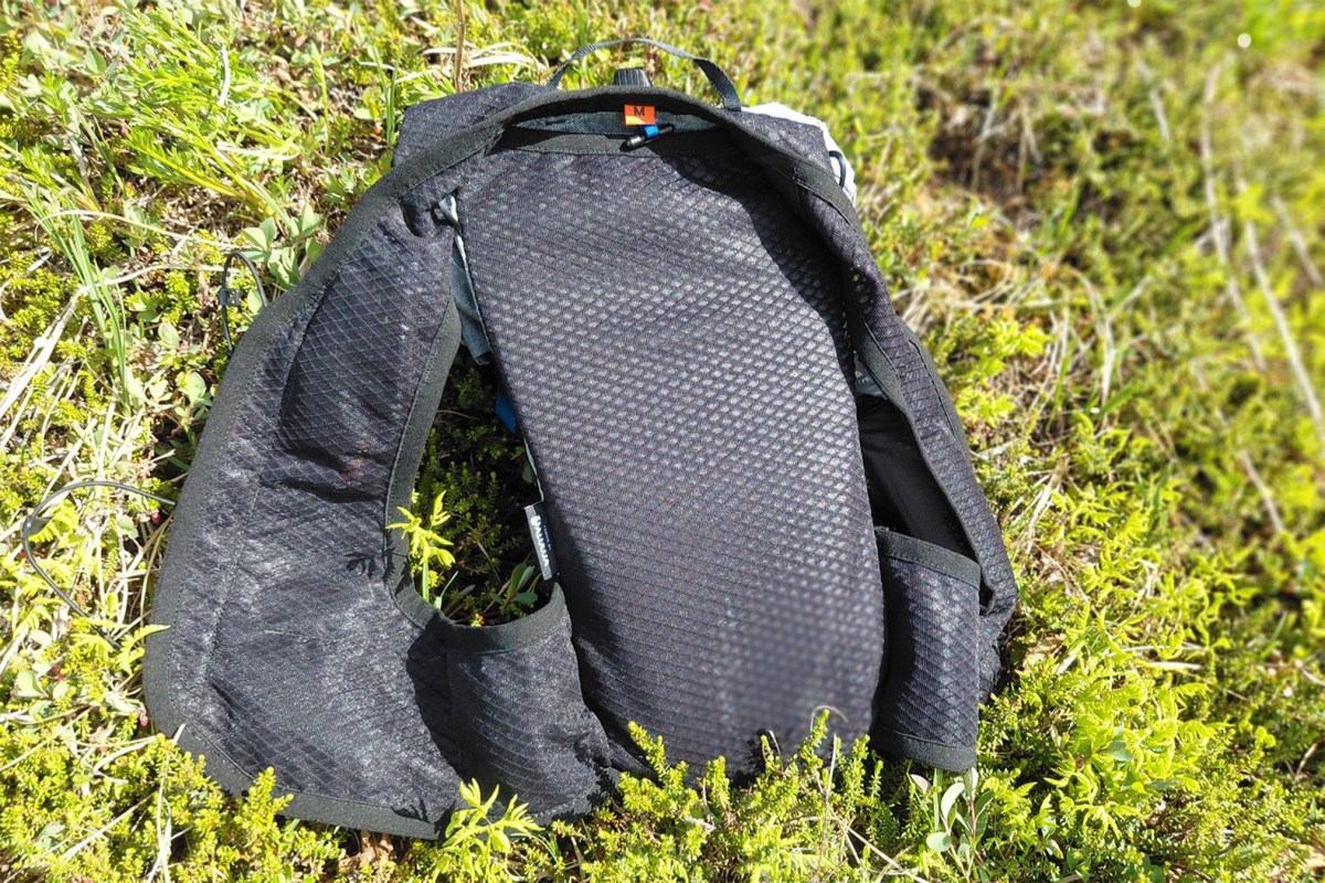 Back side of the Pemi 15 pack showing the shoulder straps and padded panel