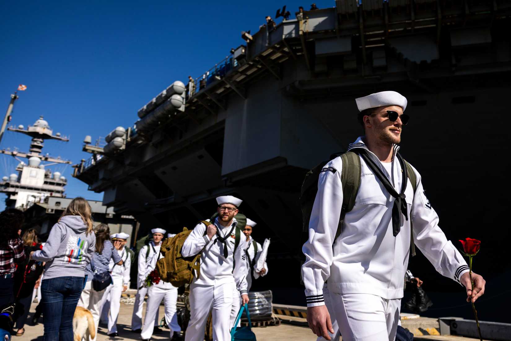 U.S. Navy sailors disembark the USS Gerald R. Ford at Naval Station Norfolk in Norfolk, Virginia.