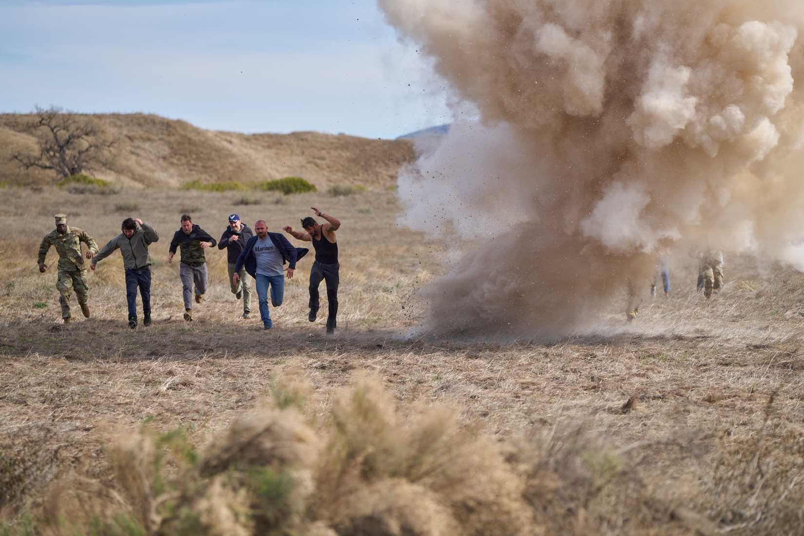 Explosive scene from the suicide prevention campaign video 'Face Your Dragon.' (Gig Line Media).