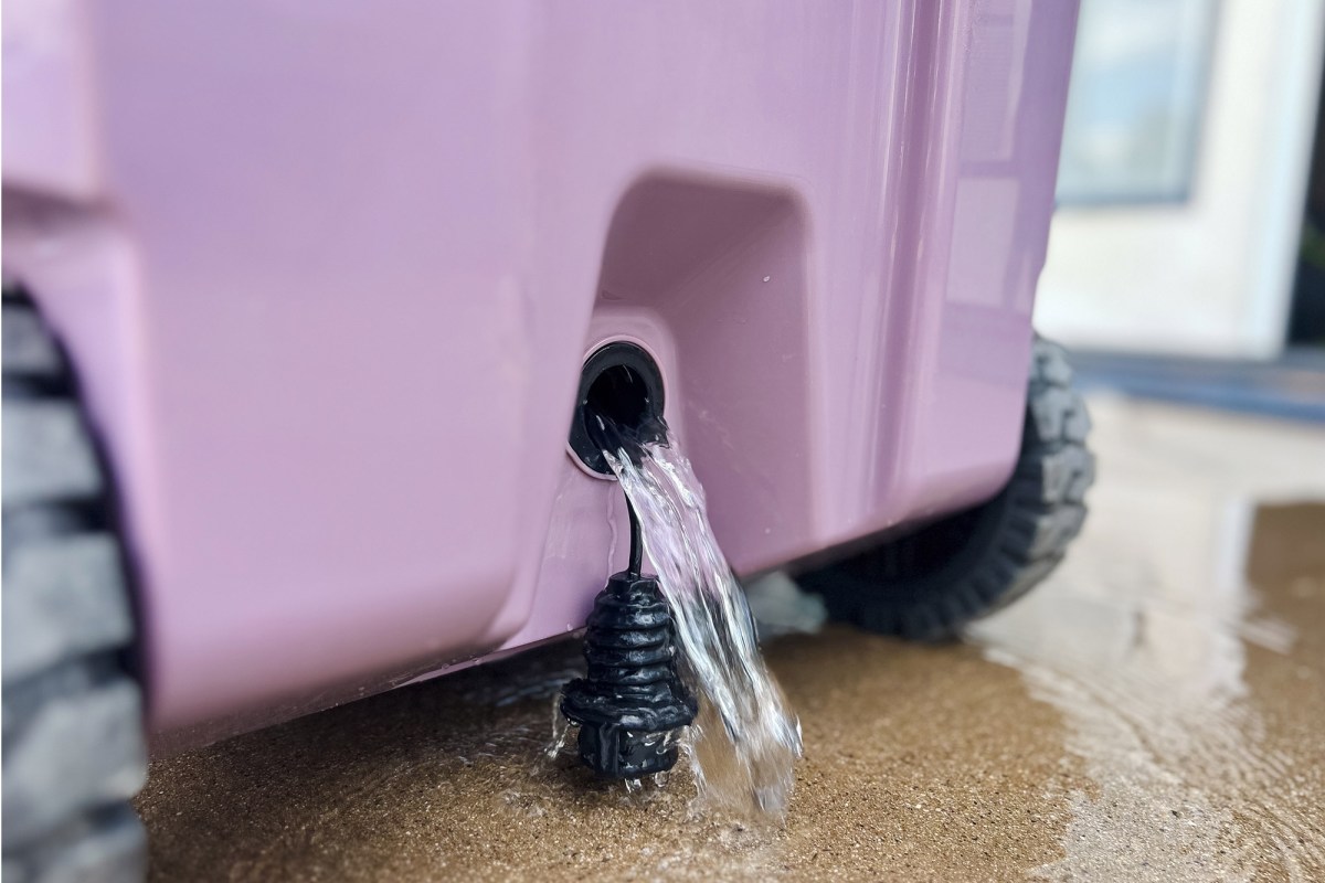 Water flowing from the drain on a BrüMate rolling cooler