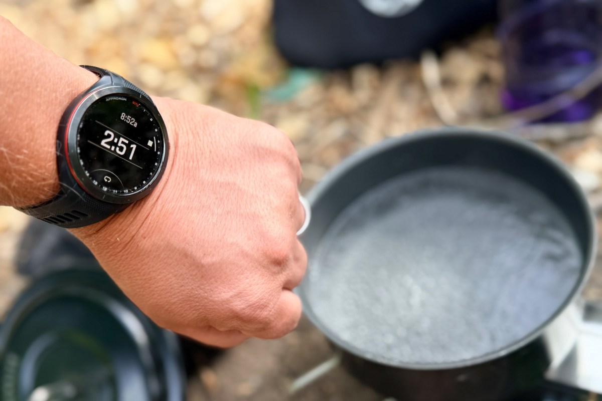 Watch timing the Optimus Gemini II as a pot of water boils on a camp stove