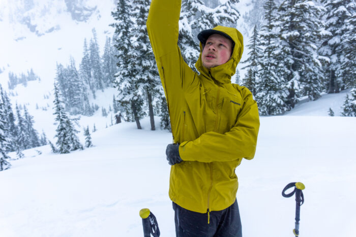 a gearjunkie tester wearing a yellow Patagonia Dual Aspect while ski touring in washington state