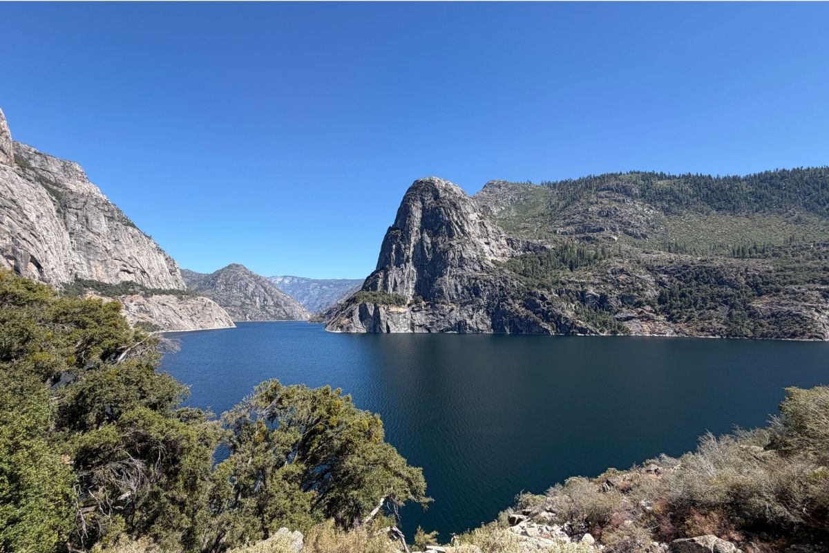 landscape of reservoir surrounded by mountains