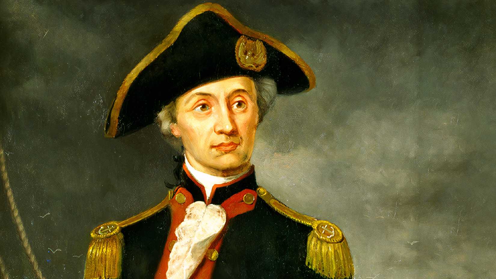 A painted portrait of John Paul Jones wearing a black naval uniform with red trim, gold epaulets and the French Order of Military Merit.