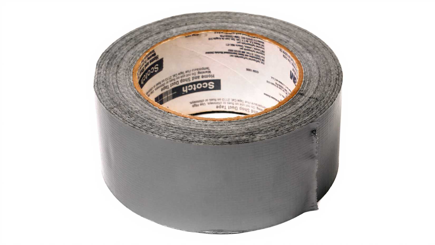 A roll of silver cloth-backed duct tape sits against a white background.