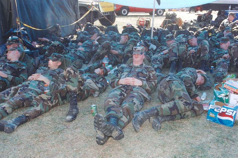 U.S. Army personnel take a break from duty at the Pentagon, 12 September 2001. 