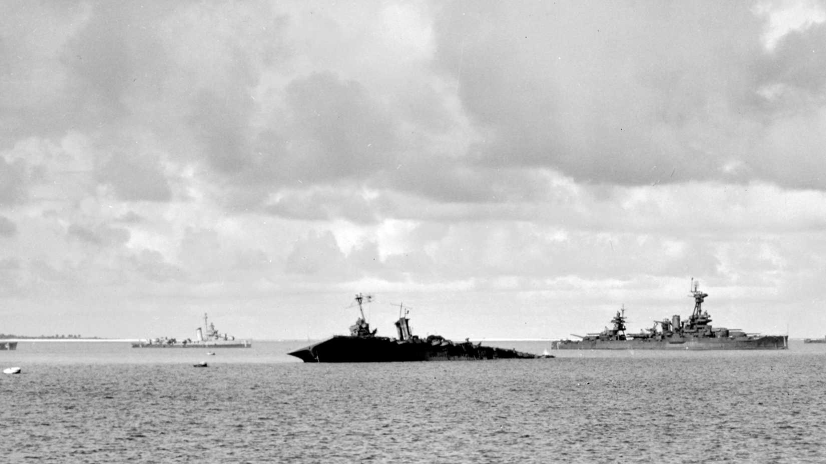 USS Saratoga sinks in Bikini Lagoon after the Operation Crossroads Baker atomic bomb test on July 25, 1946.